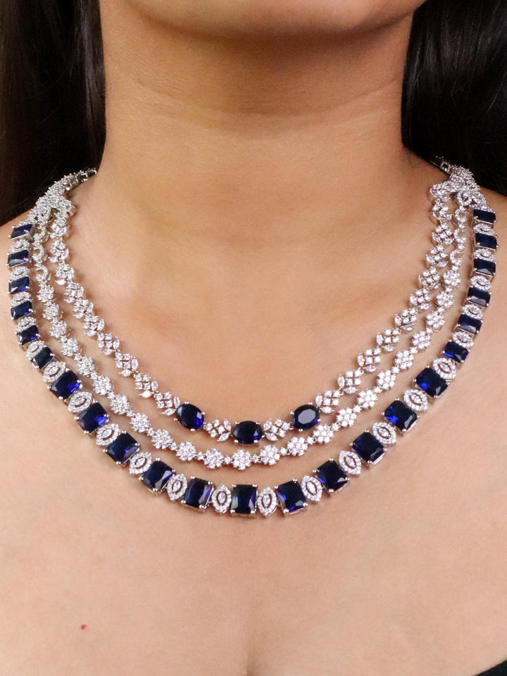 A closeup image of a girl wearing Royal Sapphire Diamond Necklace Set -1 by Live Some India