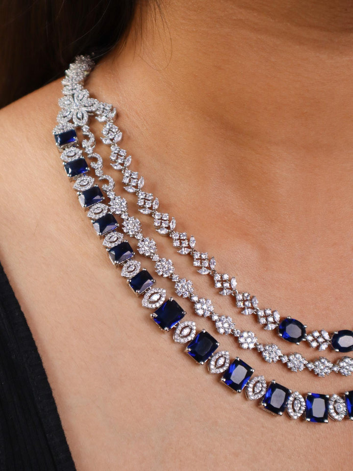 A closuep image of a girl wearing Royal Sapphire Diamond necklace set -3 by Live Some India 