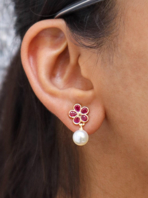 A closeup image of Ruby Floral with Pearl Drop Earrings by Live Some India 