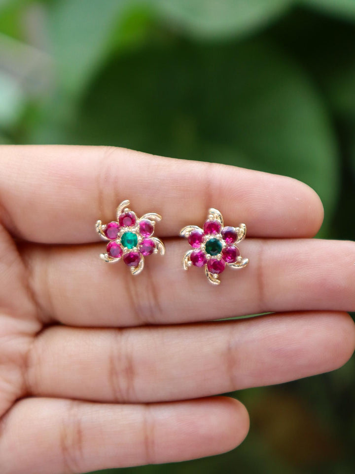 A closeup image of Ruby Golden Floral Earrings -1 by Live Some India 