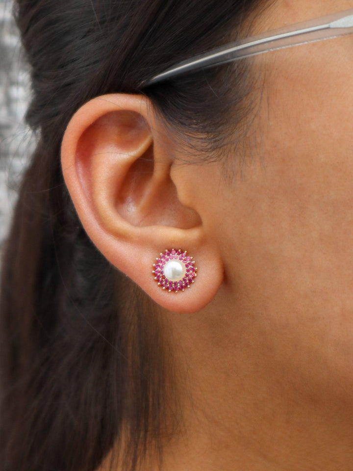 A closeup image of a girl wearing Ruby with Pearl Earrings by Live Some India 