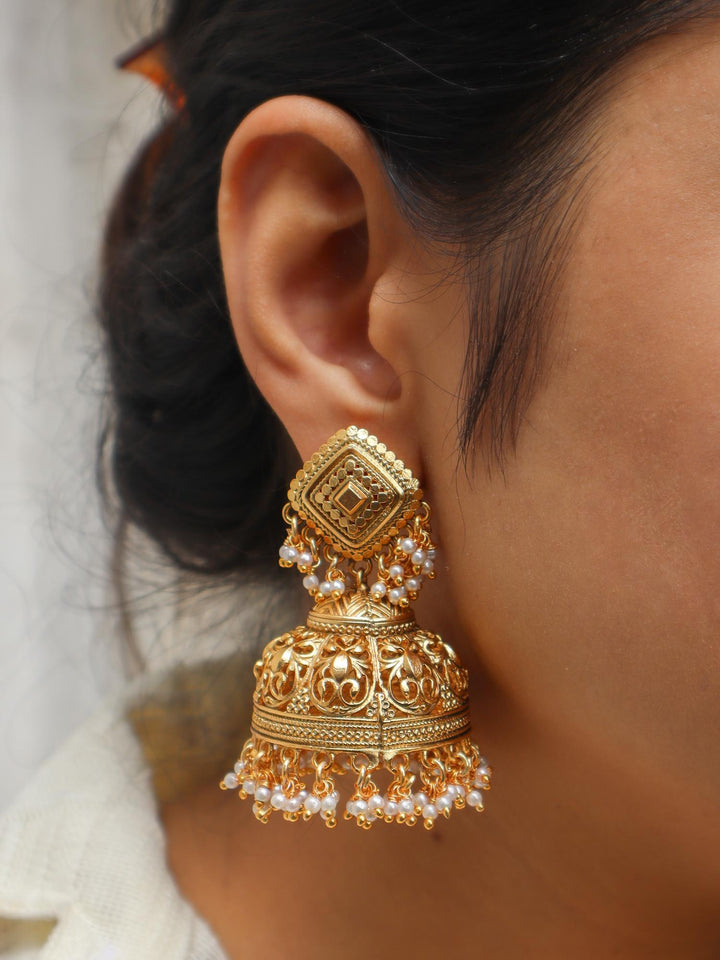 Girl wearing Saavi Temple Jhumka Earrings by Live Some India