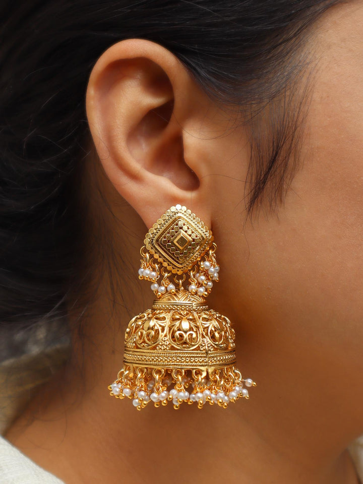 Side Angle of Girl wearing Saavi Temple Jhumka Earrings by Live Some India 