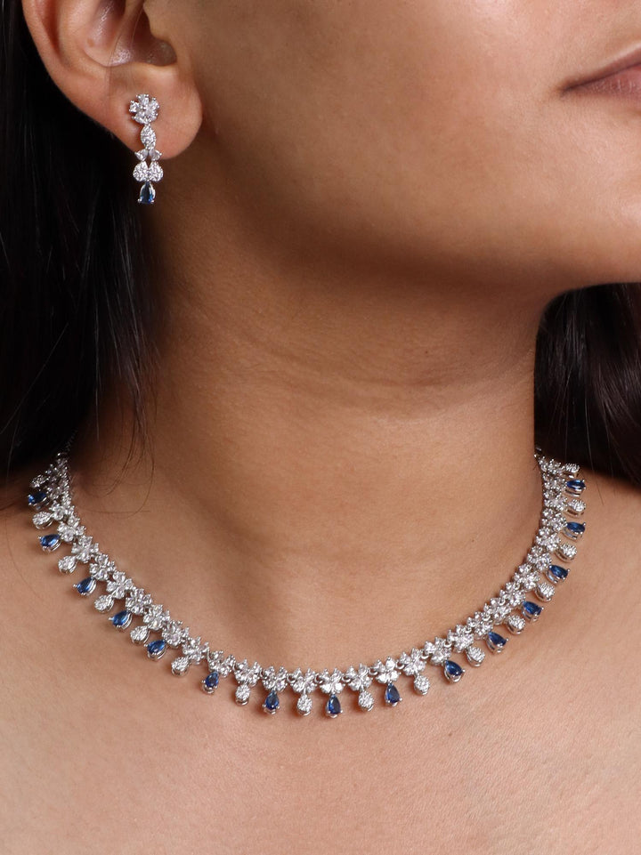 A closeup image of Sapphire Blue Drop Diamond Necklace Set by Live Some India 