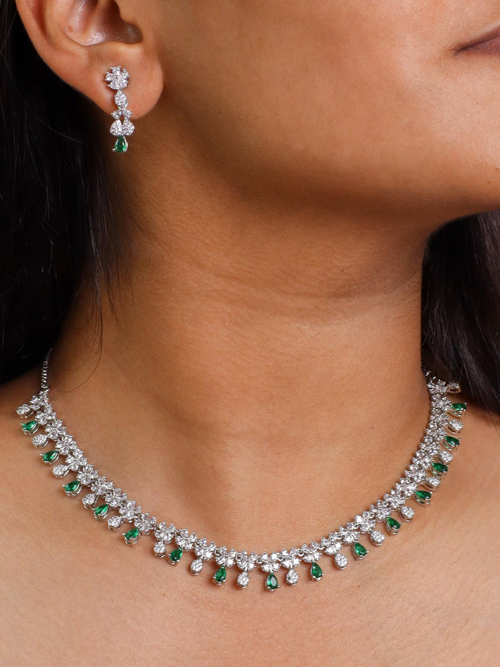 A closeup image of Sapphire Green Drop Diamond Necklace Set by Live Some India 