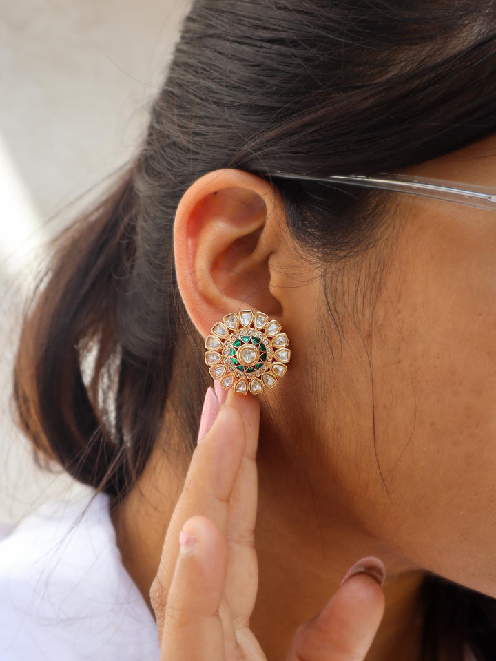 A closeup image of Satvi Kundan Polki Stud Earrings by Live Some India