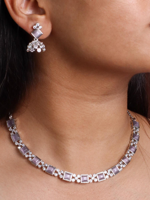 A closeup image of a girl wearing Silver Purple Diamond Necklace Set -3 by Live Some India 