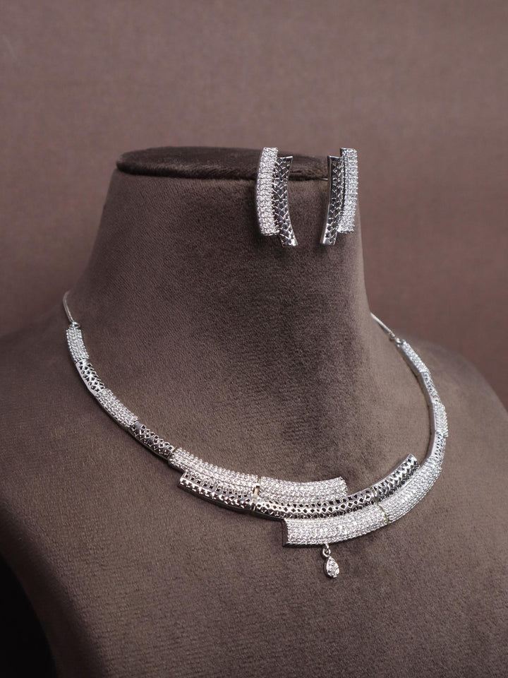 A closeup image of Snake Diamond Necklace Set -2 by Live Some India on a brown dummy 