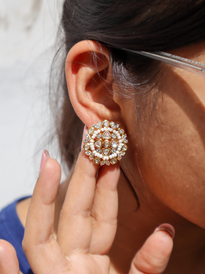 A closeup image of Soni Kundan Polki Stud Earrings by Live Some India