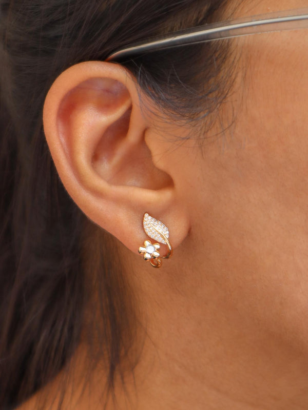 A closeup image of a girl wearing Statement Floral Leaf Earrings  by Live Some India