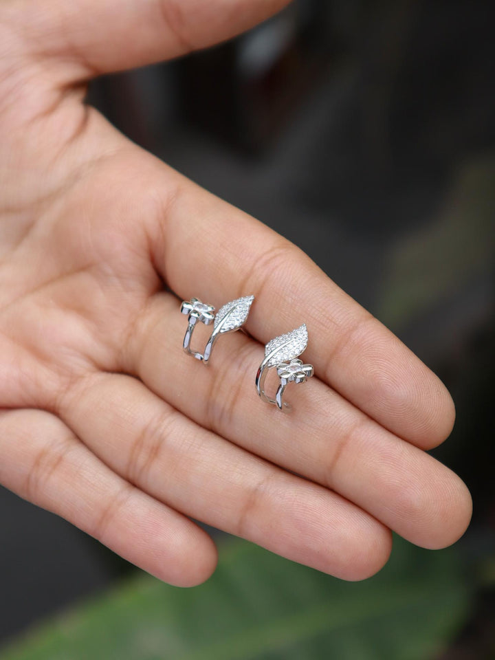 A closeup image of Statement Floral Leaf Earrings -2 by Live Some India in the variant silver 