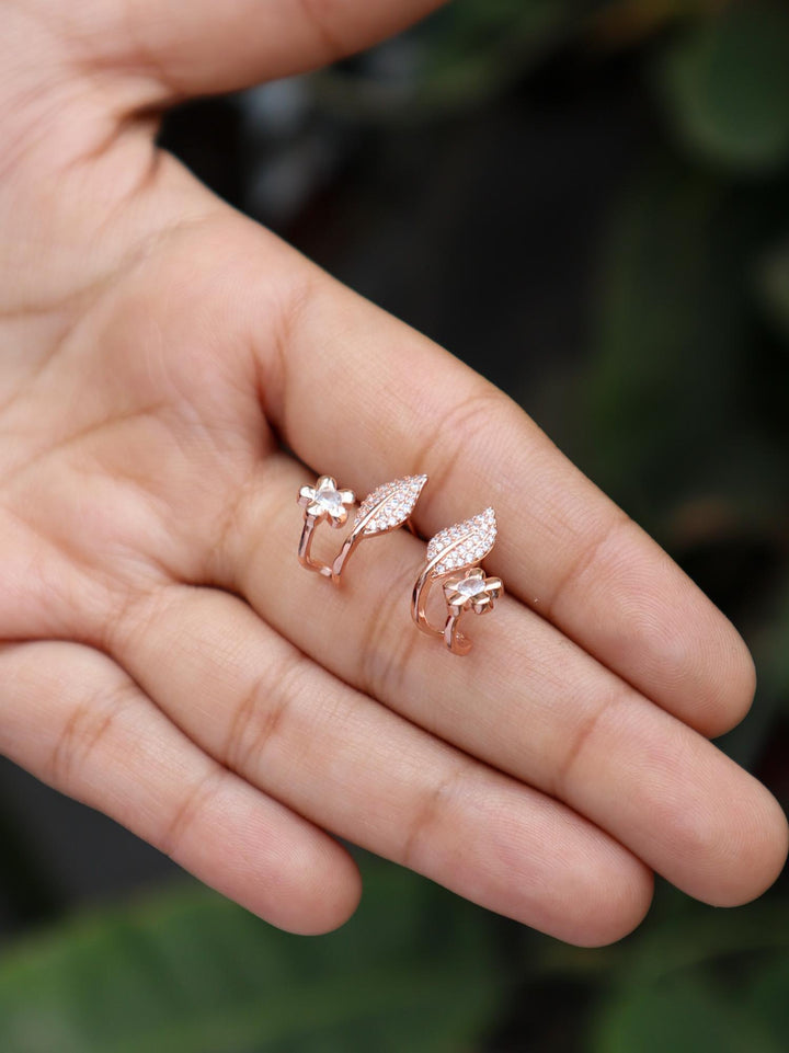 A closeup image of Statement Floral Leaf Earrings -3 by Live Some India in variant Rose Gold 