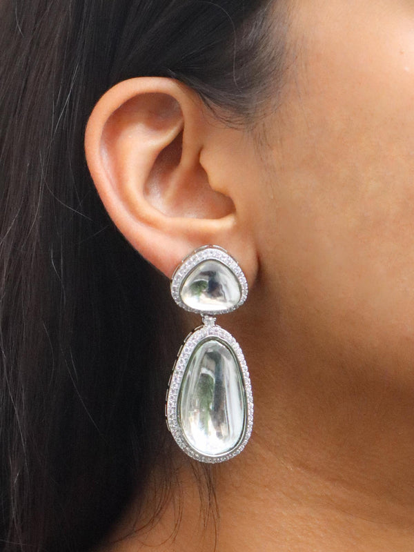 A closeup image of a girl wearing Stellar Polki Contemporary Earrings -1 by Live Some India 