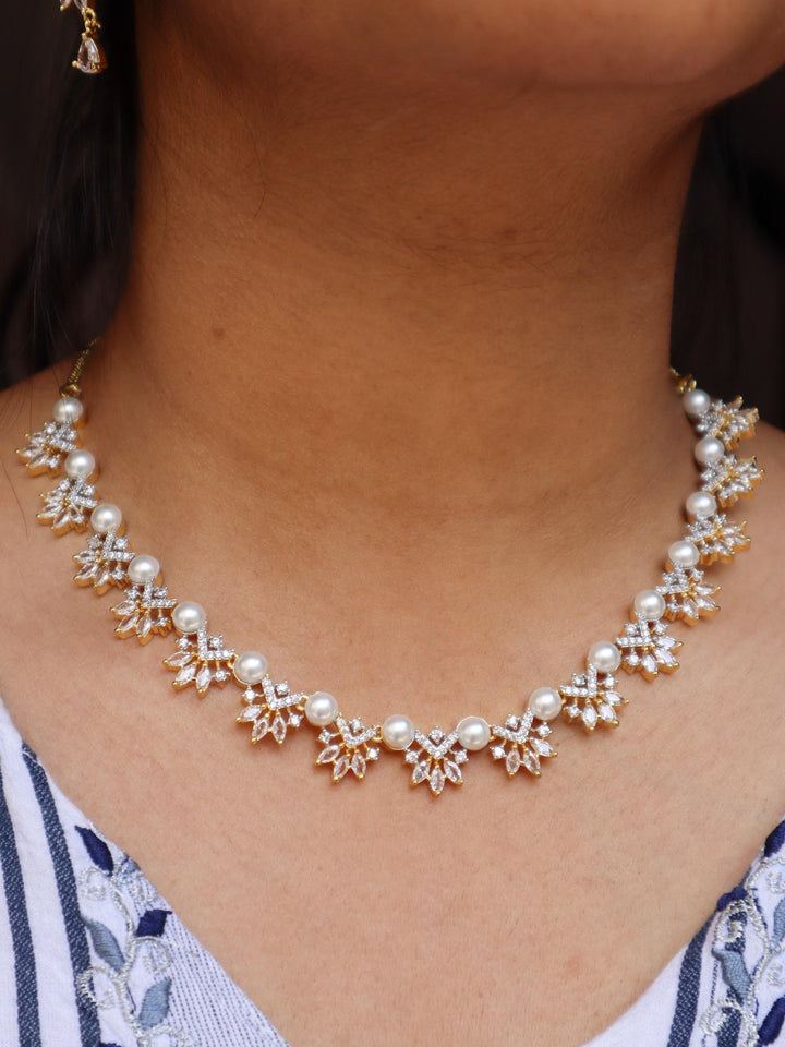 A closeup image of a girl wearing Sunrise Pearl Necklace Set -4 by Live Some India 