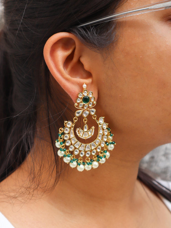 A closeup image of a girl wearing Tara Kundan Polki Chandbali Earrings -1  by Live Some India 