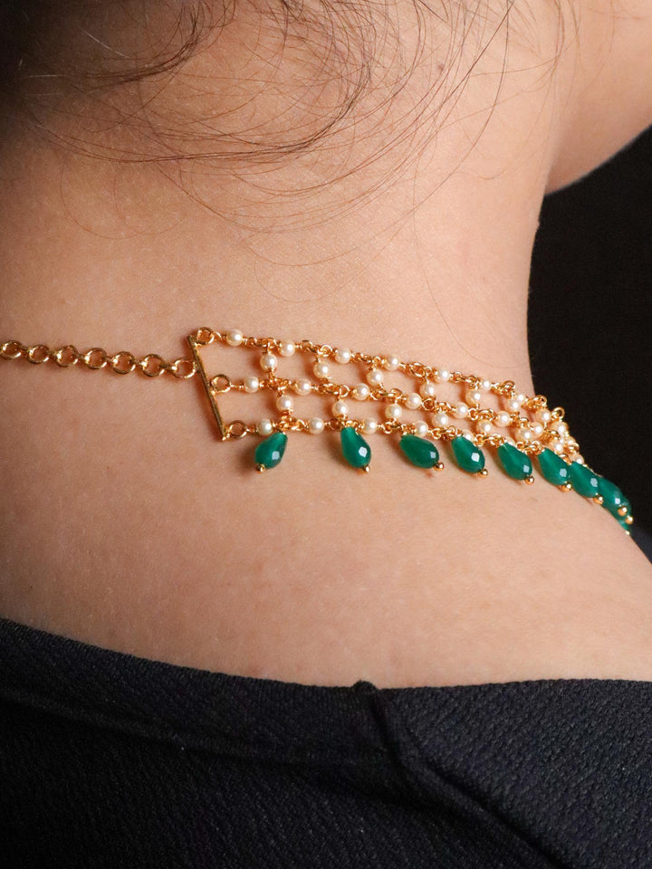Joining of the Three Line Handmade Necklace with Emerald Beads at the end.
