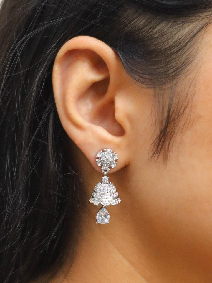 Girl wearing Tia Diamond Small Dangle Jhumka Earrings by Live Some India