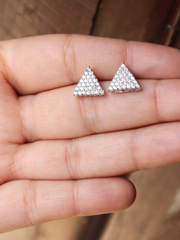 A closeup image of Triangular Everyday Earrings -1 on a girl's hand by Live Some India 