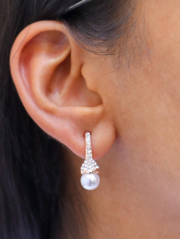 A closeup image of Umbrella Rose Gold Earrings by Live Some India 