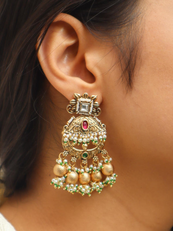 Girl wearing Vaishnavi Dangle Earrings by Live Some India