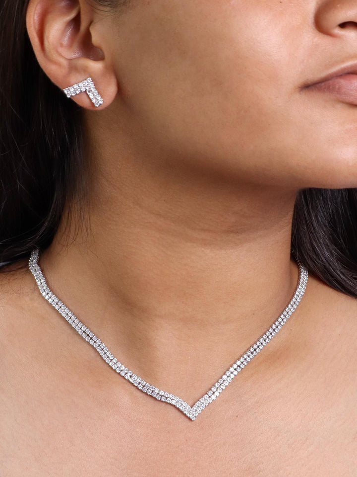 A closeup image of a girl wearing Vamika Diamond Necklace Set -3 by Live Some India 