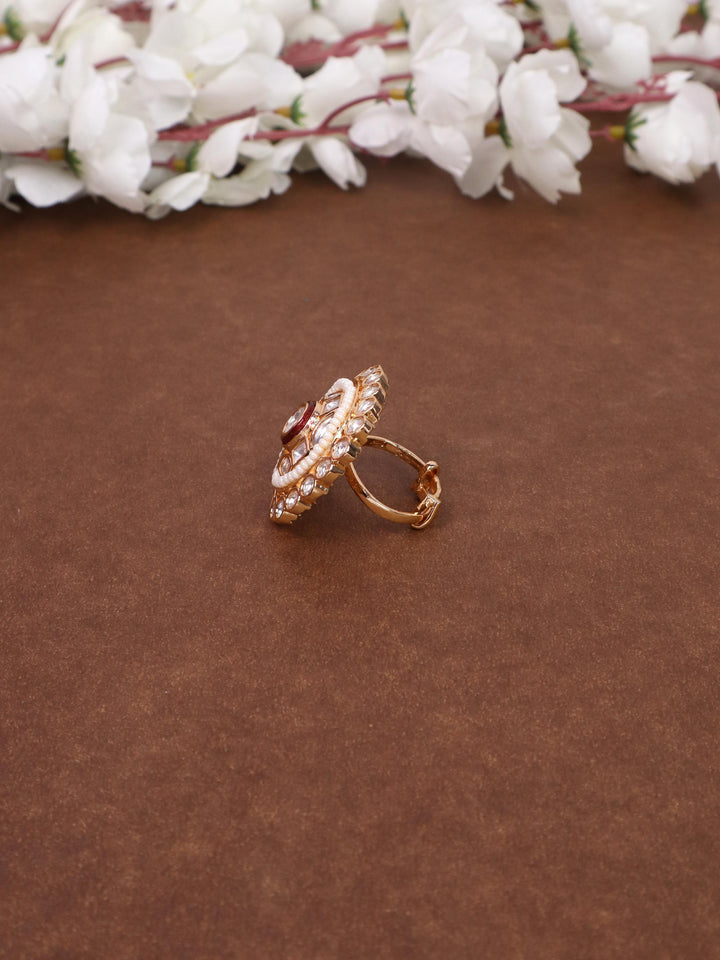 A closeup image of Vanya Beaded Kundan Polki Ring -3 by Live Some India on a brown background