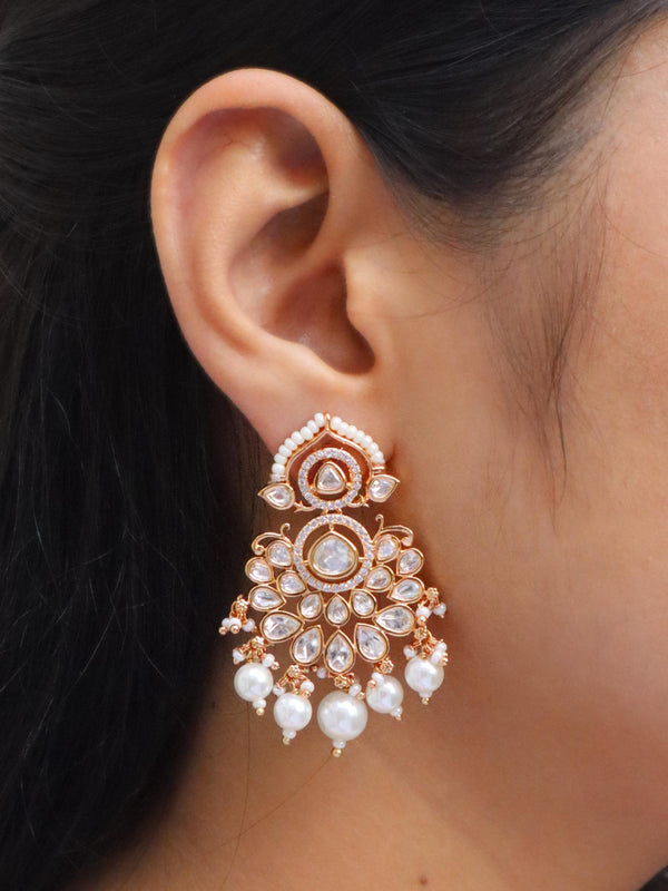 Girl wearing Yuri Kundan Polki Dangle Earrings by Live Some India