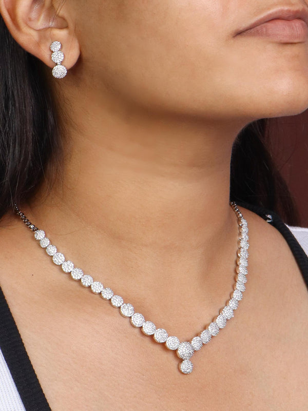 A closeup image of a girl wearing Zaya Diamond Necklace Set -3 by Live Some India 