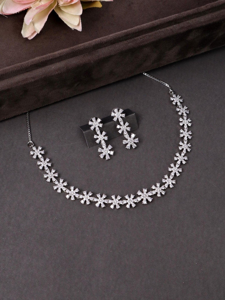 Aaliyah Floral Diamond Necklace Set - by Live Some India in just A closeup image of Aaliyah Floral Diamond Necklace Set by Live Some India on a black background