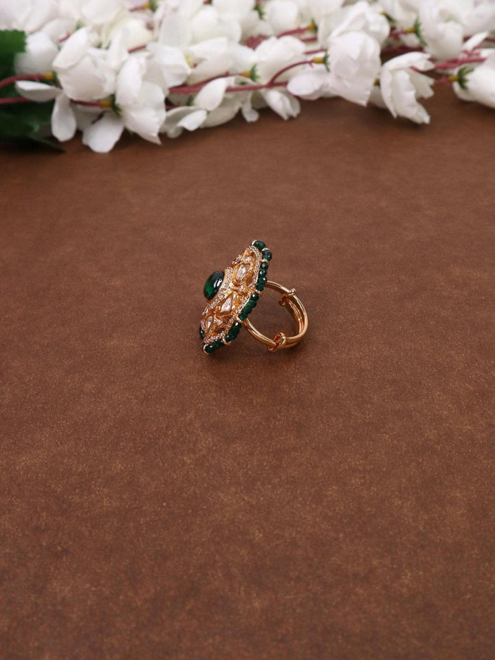 Adah Beaded Kundan Polki Ring - by Live Some India in just A closeup image of Adah Green Beaded Kundan Polki Ring -1 by Live Some India on a brown background