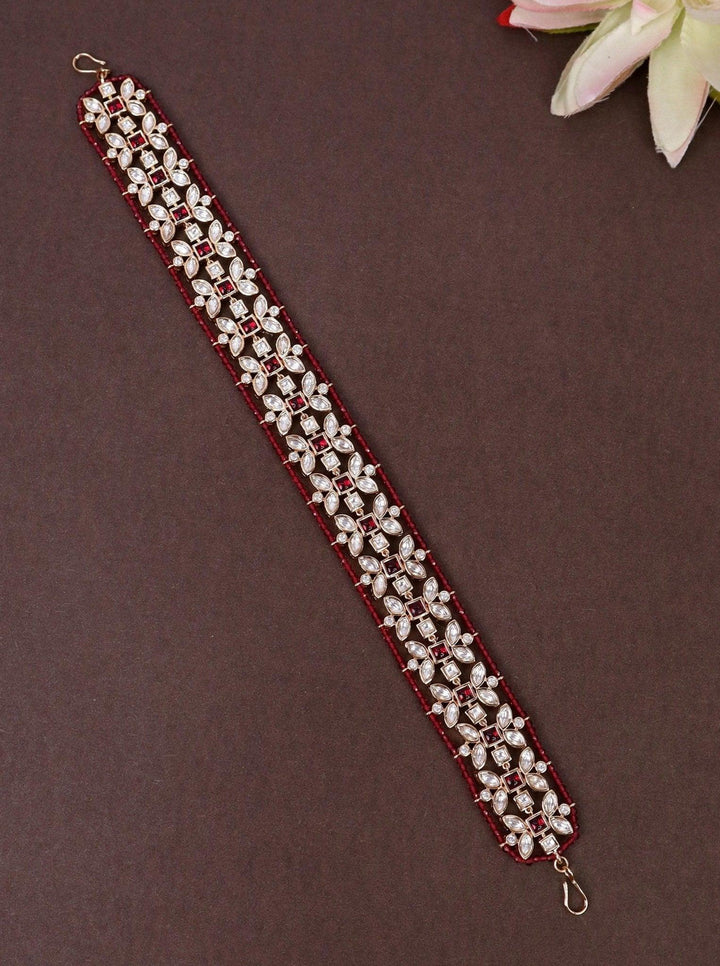 Ahana Pink Beaded Elegant Matha Patti - by Live Some India in just A closeup image of Ahana Pink Beaded Elegant Matha Patti by Live Some India on a brown background