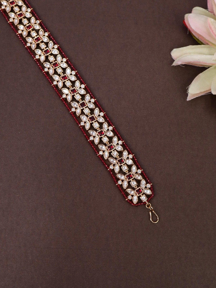 Ahana Pink Beaded Elegant Matha Patti - by Live Some India in just A closeup image of Ahana Pink Beaded Elegant Matha Patti -1 by Live Some India on a brown background