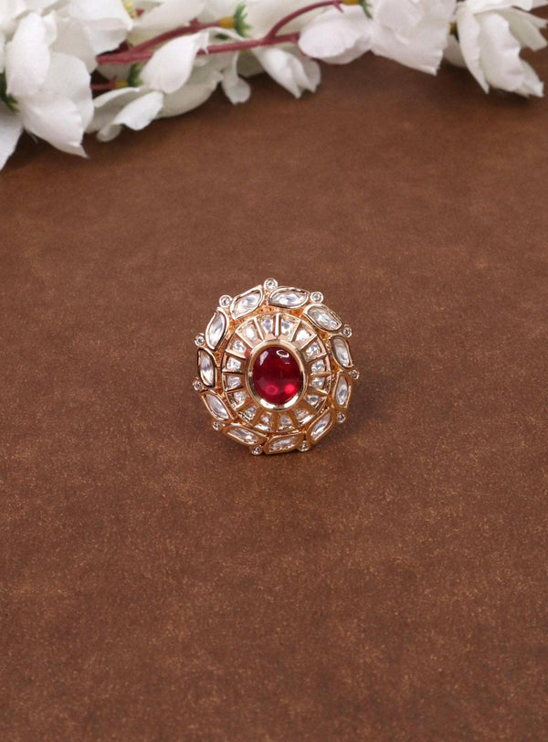 Alia Kundan Polki Ring - by Live Some India in just Alia Kundan Polki Ring - by Live Some India in just A closeup image of Alia Red Kundan Polki Ring by Live Some India on a brown background