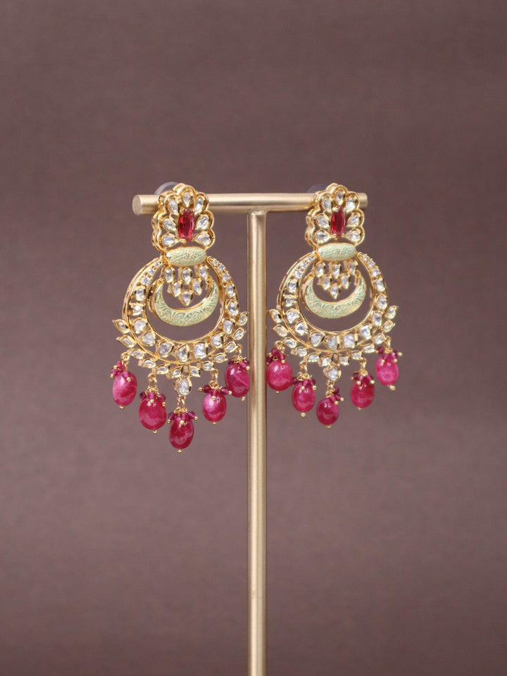 Beautiful Kundan Polki Chandbali Earrings - by Live Some India in just Beautiful Kundan Polki Chandbali Earrings - by Live Some India in just A closeup image of Beautiful Kundan Polki Chandbali Earrings -1 by Live Some India on an earring stand