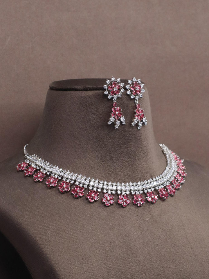 Blossom Pink Diamond Necklace Set - by Live Some India in just A closeup image of Blossom Pink Diamond Necklace Set by Live Some India on a brown dummy