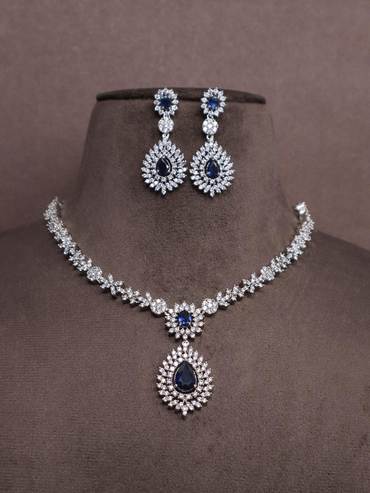 Blue Sapphire Statement Diamond Necklace Set - by Live Some India in just A closeup image of Blue Sapphire Statement Diamond Necklace Set - 1 by Live Some India on a brown dummy