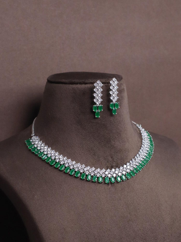 Classic Emerald Diamond Necklace Set - by Live Some India in just A closeup image of Classic Emerald Diamond Necklace Set by Live some India on a brown dummy