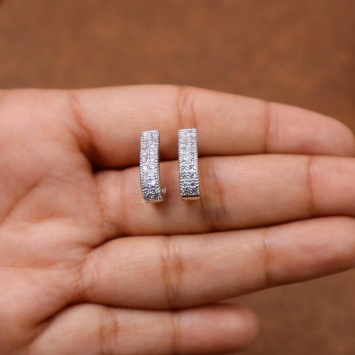 Dainty Statement Earrings - by Live Some India in just A closeup image of a girl holding Silver Dainty Statement Earrings -2 by Live Some India