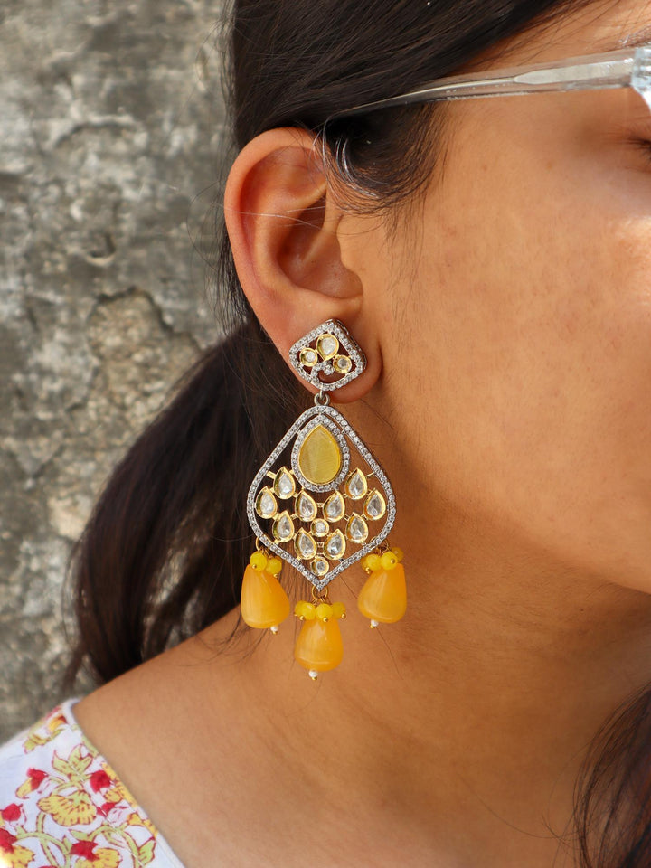 Dakshya Kundan Polki Dangler Earrings - by Live Some India in just A closeup image of a girl wearing Dakshya Yellow Kundan Polki Dangler Earrings -1 by Live Some India