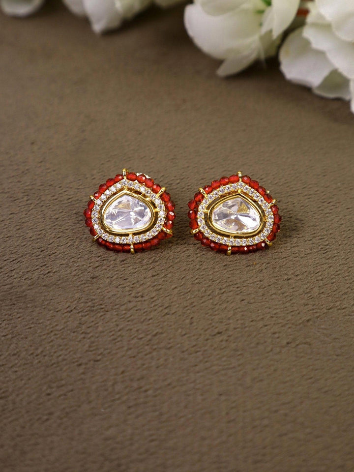 Dia Motif Kundan Polki Stud Earrings - by Live Some India in just Dia Motif Kundan Polki Stud Earrings - by Live Some India in just Dia Motif Kundan Polki Stud Earrings - by Live Some India in just A closeup image of Dia Motif Red Kundan Polki Stud Earrings by Lve Some India on a grey tray