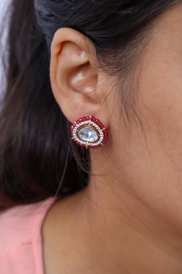 Dia Motif Kundan Polki Stud Earrings - by Live Some India in just Dia Motif Kundan Polki Stud Earrings - by Live Some India in just Dia Motif Kundan Polki Stud Earrings - by Live Some India in just A closeup image of a girl wearing Dia Motif Kundan Polki Red Stud Earrings -1 by Live Some India