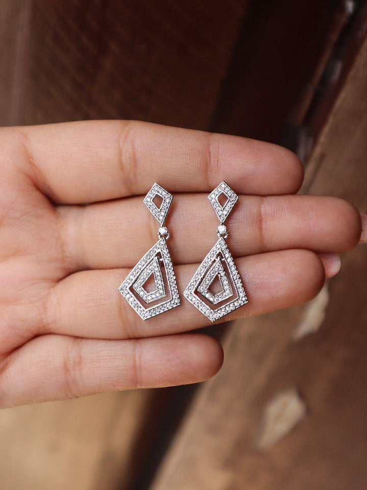 Diamond Dangler Earrings - by Live Some India in just A closeup image of Diamond Dangler Earrings -1 on a girl's hand by Live Some India