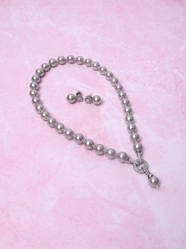 Elegant Three Way Pearl Necklace Set - by Live Some India in just A closeup image of Elegant Three Way Pearl Necklace Set -7 by Live Some India on a pink background