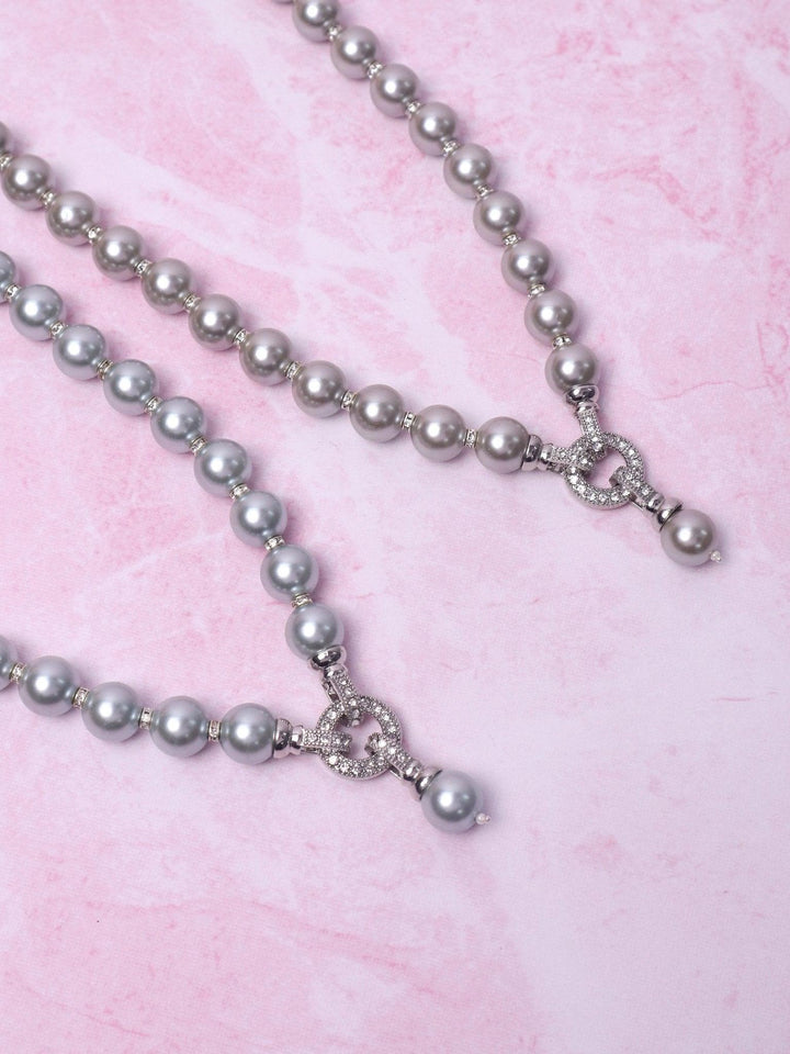 Elegant Three Way Pearl Necklace Set - by Live Some India in just A closeup image of Elegant Three Way Pearl Necklace Set -5 by Live Some India on a pink background