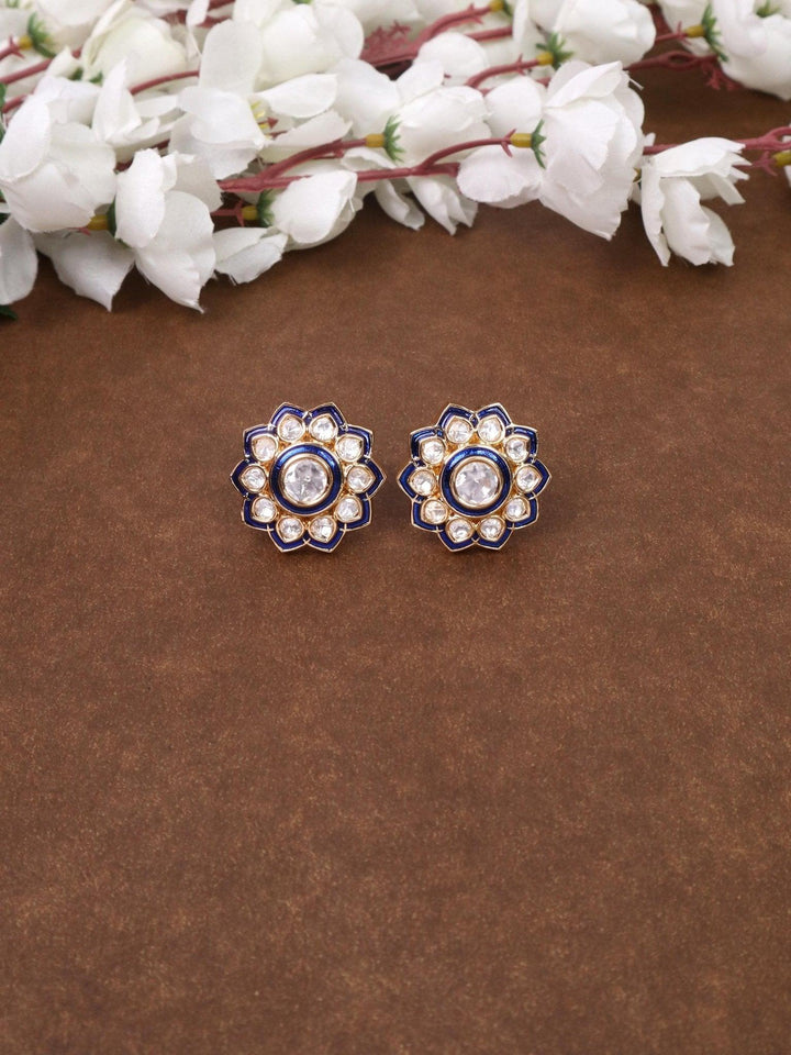 Falak Kundan Polki Stud Earrings - by Live Some India in just A closeup image of Falak Blue Kundan Polki Stud Earrings by Live Some India on a brown background