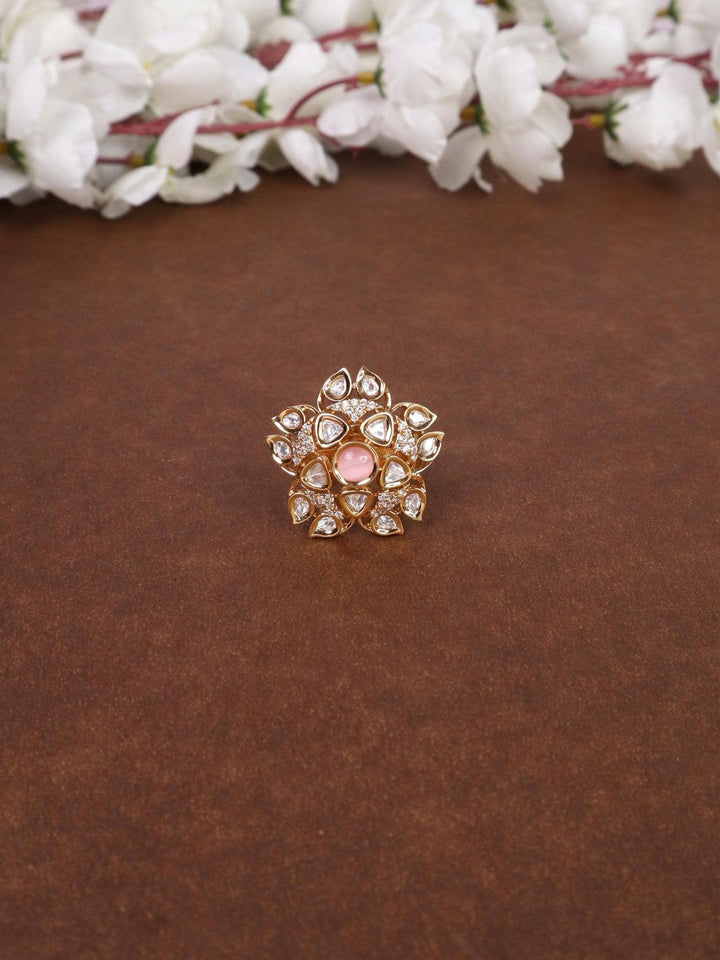 Gauri Kundan Polki Ring - by Live Some India in just A closeup image of Gauri Pink Kundan Polki Ring -1 by Live Some India on a brown background