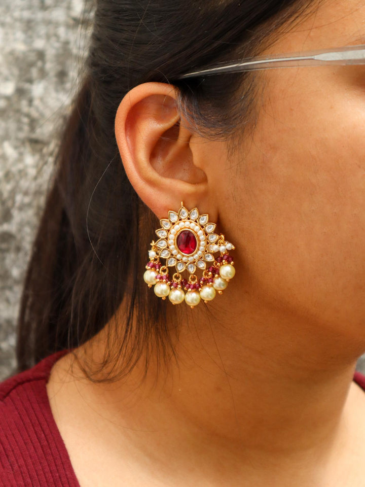 Heer Kundan Polki Dangler Earrings - by Live Some India in just A closeup image of a girl wearing Heer Red Kundan Polki Dangler Earrings -1 by Live Some India