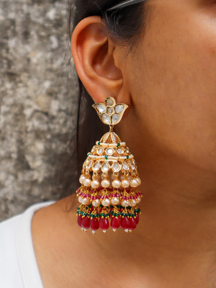 Idah Kundan Polki Jhumka Earrings - by Live Some India in just A closeup image of a girl wearing Idah Red Kundan Polki Jhumka Earrings by Live Some India