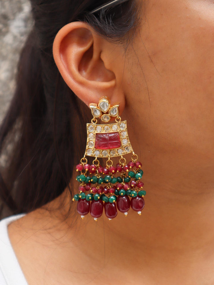 Lotus Drop Kundan Polki Dangler Earrings - by Live Some India in just A closeup image of a girl wearing Lotus Drop Red Kundan Polki Dangler Earrings by Live Some India