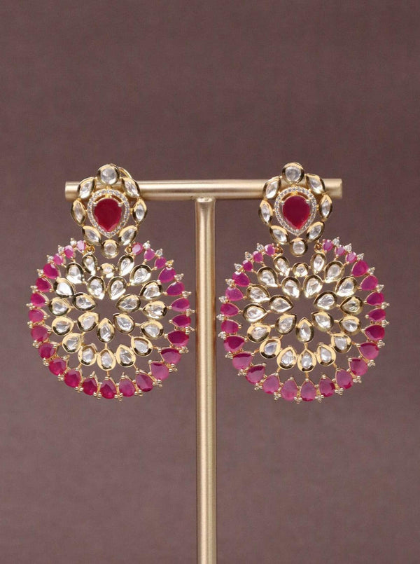 Magenta Chakra Kundan Polki Dangler Earrings - by Live Some India in just A closeup image of Magenta Chakra Kundan Polki Dangler Earrings -2 by Live Some India on a brown background